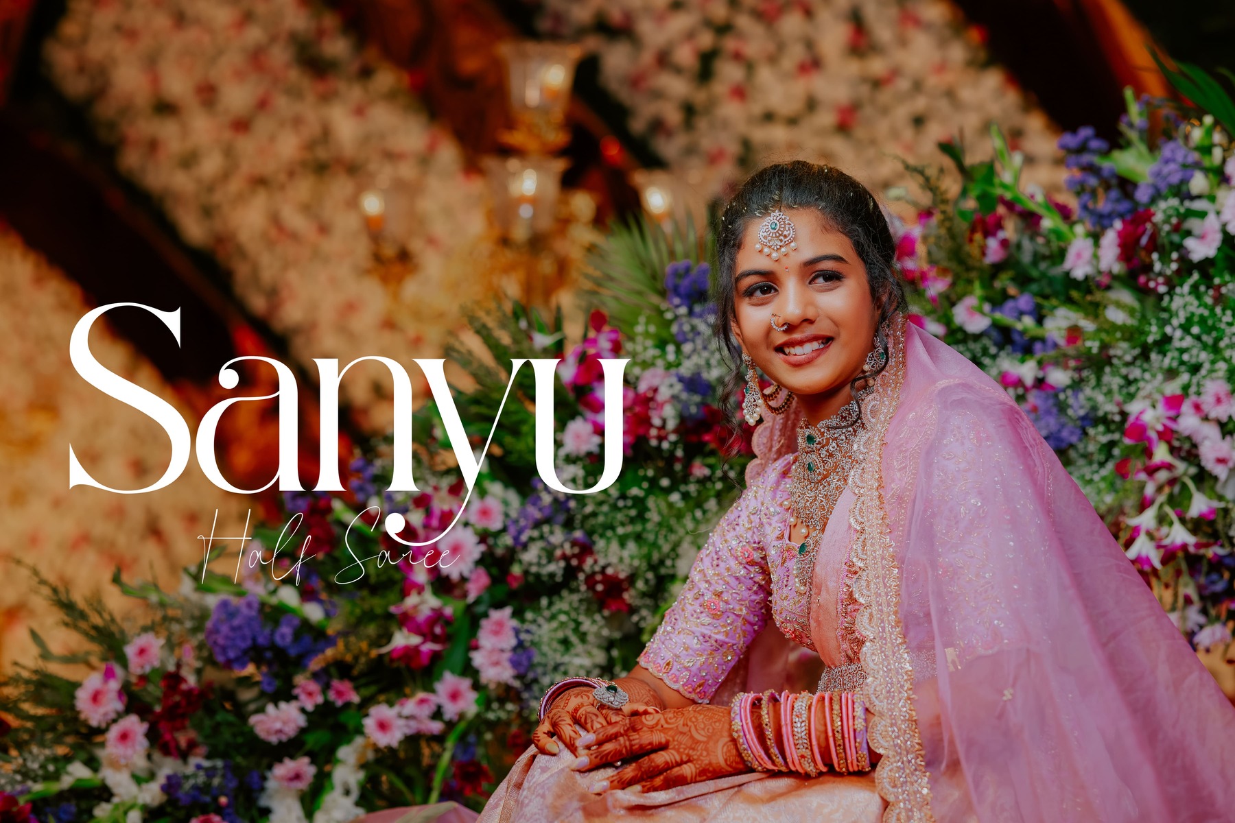 Sanyu posing gracefully in her traditional half-saree during the main event.