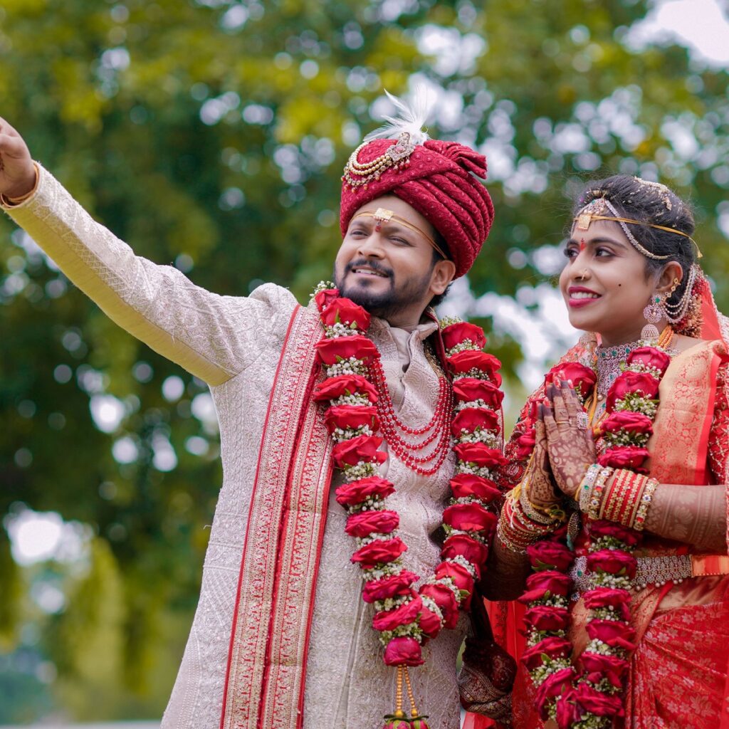 Sahana and Sai Teja performing traditional wedding rituals surrounded by family and joyful celebrations.