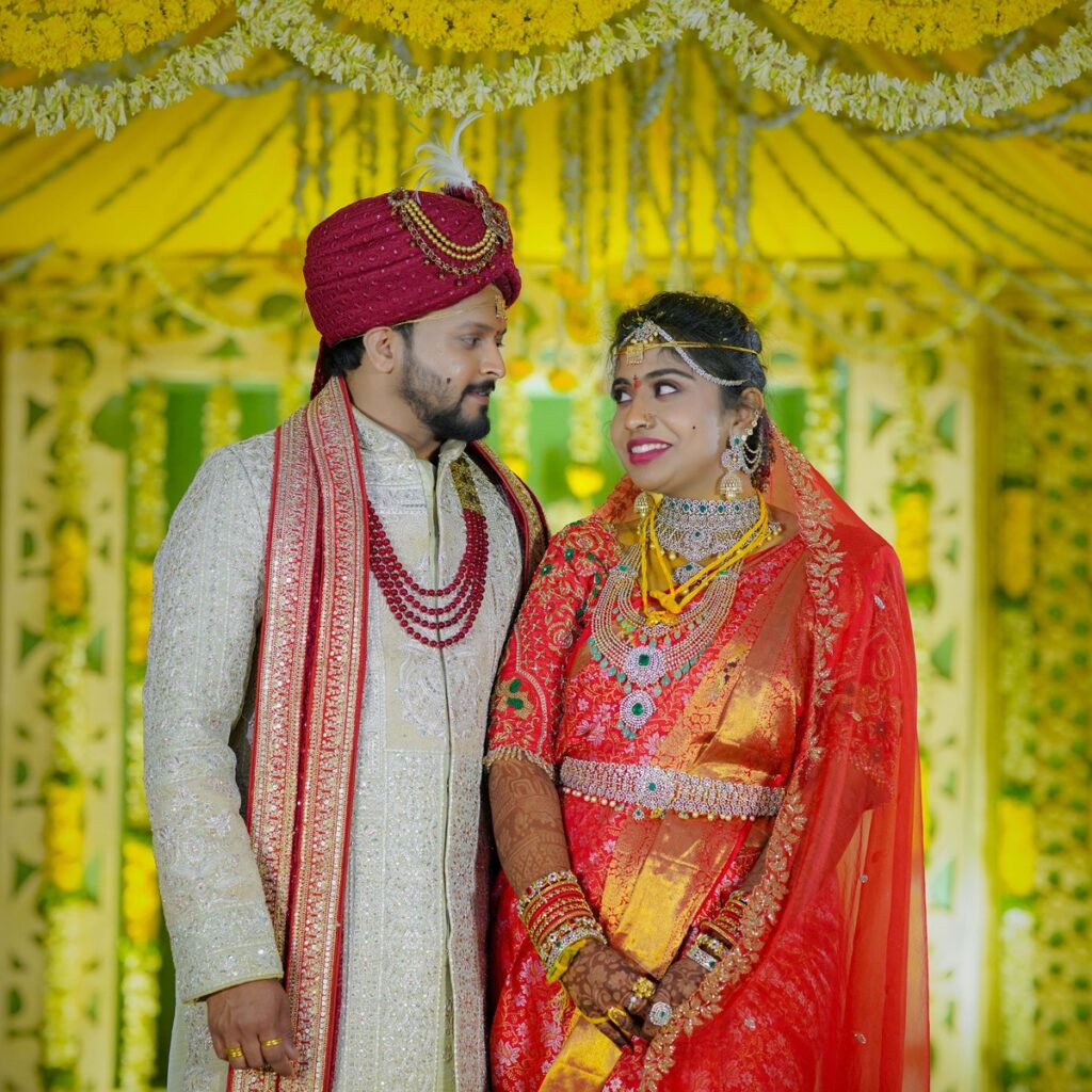 Sahana and Sai Teja performing traditional wedding rituals surrounded by family and joyful celebrations.