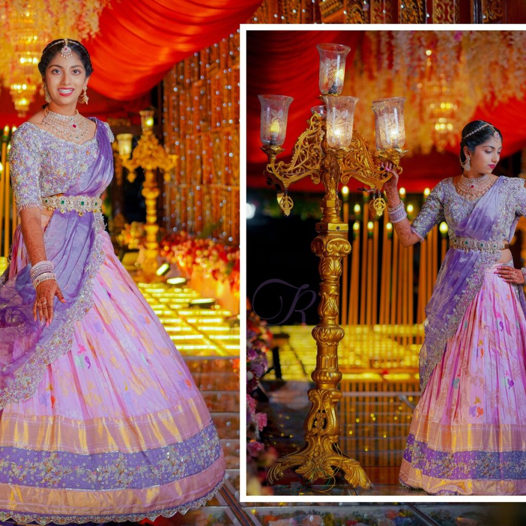 Ranhitha and Sanhitha elegantly dressed in half-sarees during the main ceremony, surrounded by family blessings.