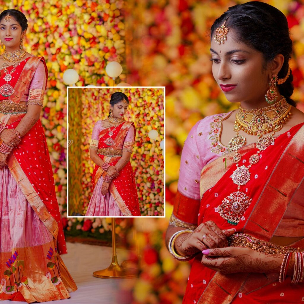 Ranhitha and Sanhitha elegantly dressed in half-sarees during the main ceremony, surrounded by family blessings.