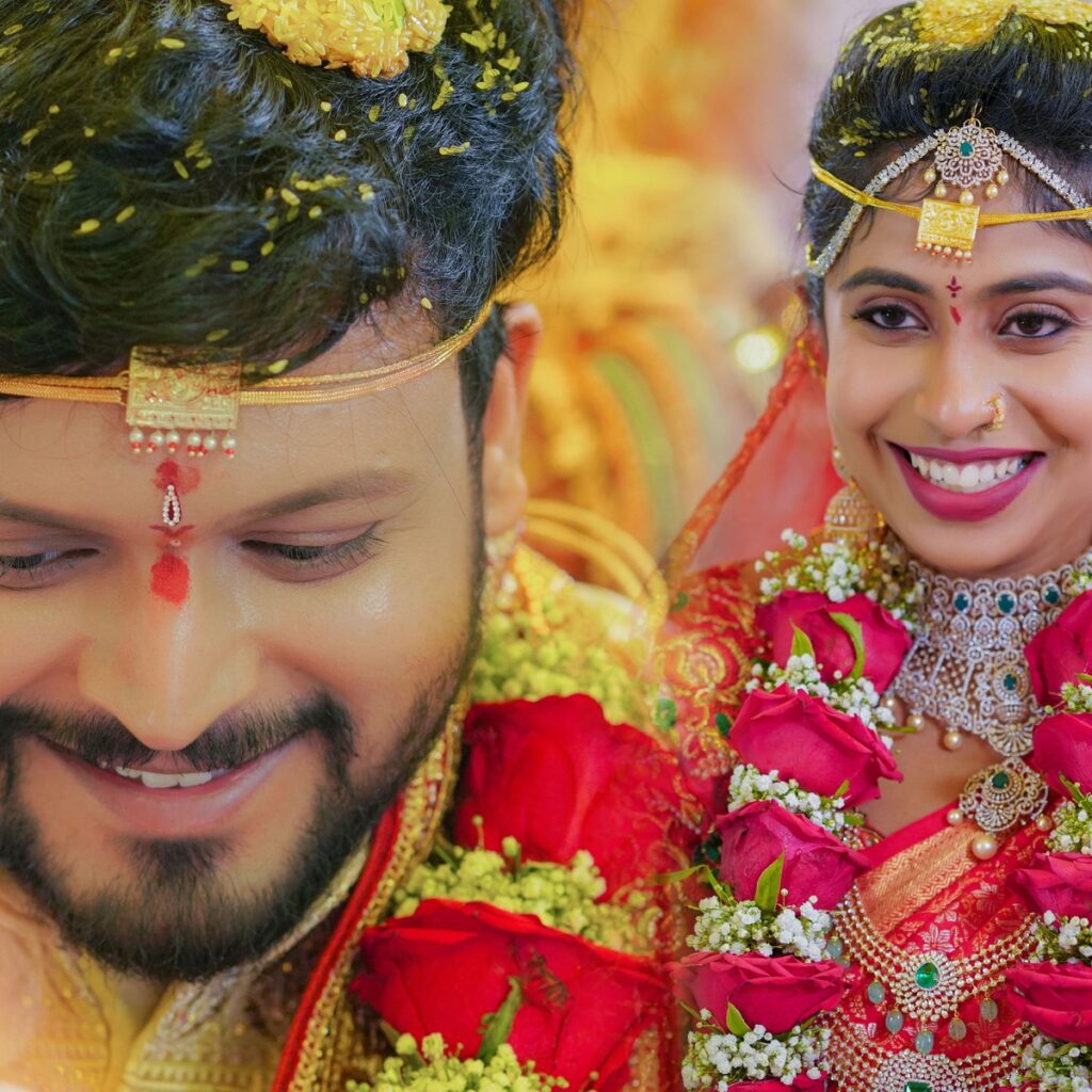 Sahana and Sai Teja performing traditional wedding rituals surrounded by family and joyful celebrations.